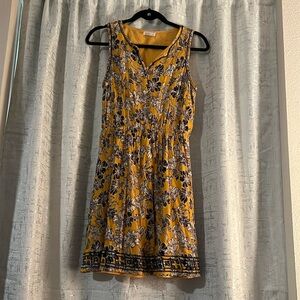 Goldenrod and navy dress. M.